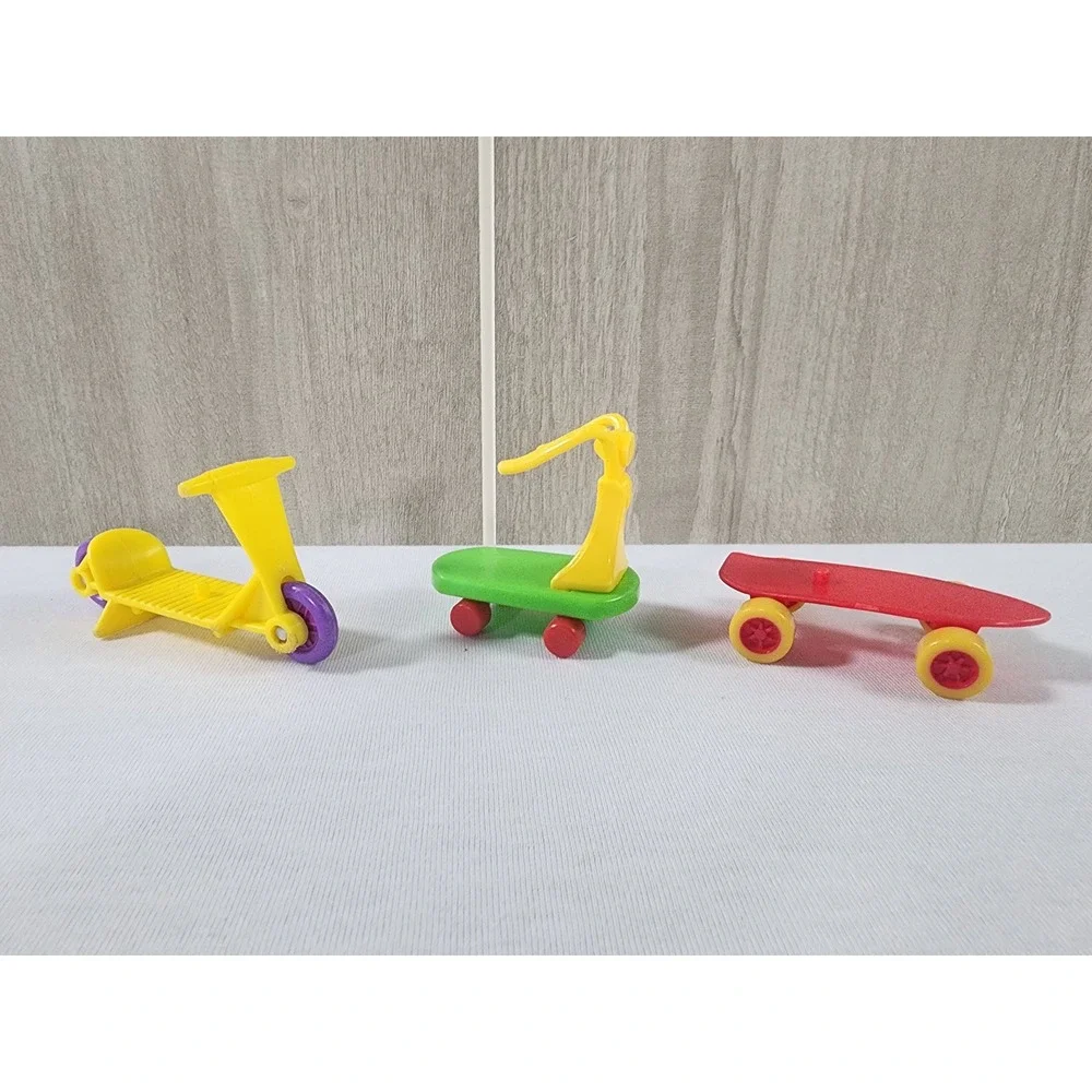 Vintage 1980s McDonalds Happy Meal Lot Garfield Muppet Babies Scooter Skateboard